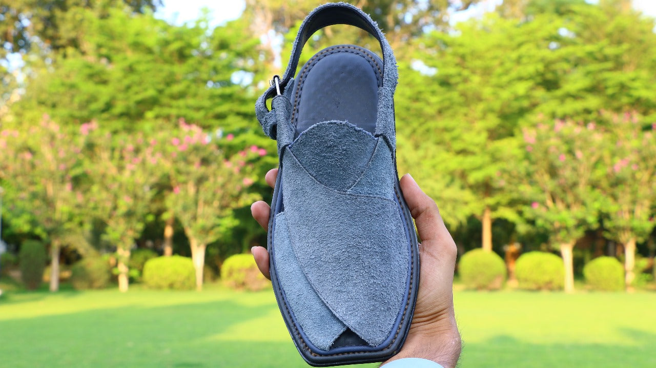“Handmade footwear for timeless journeys.”