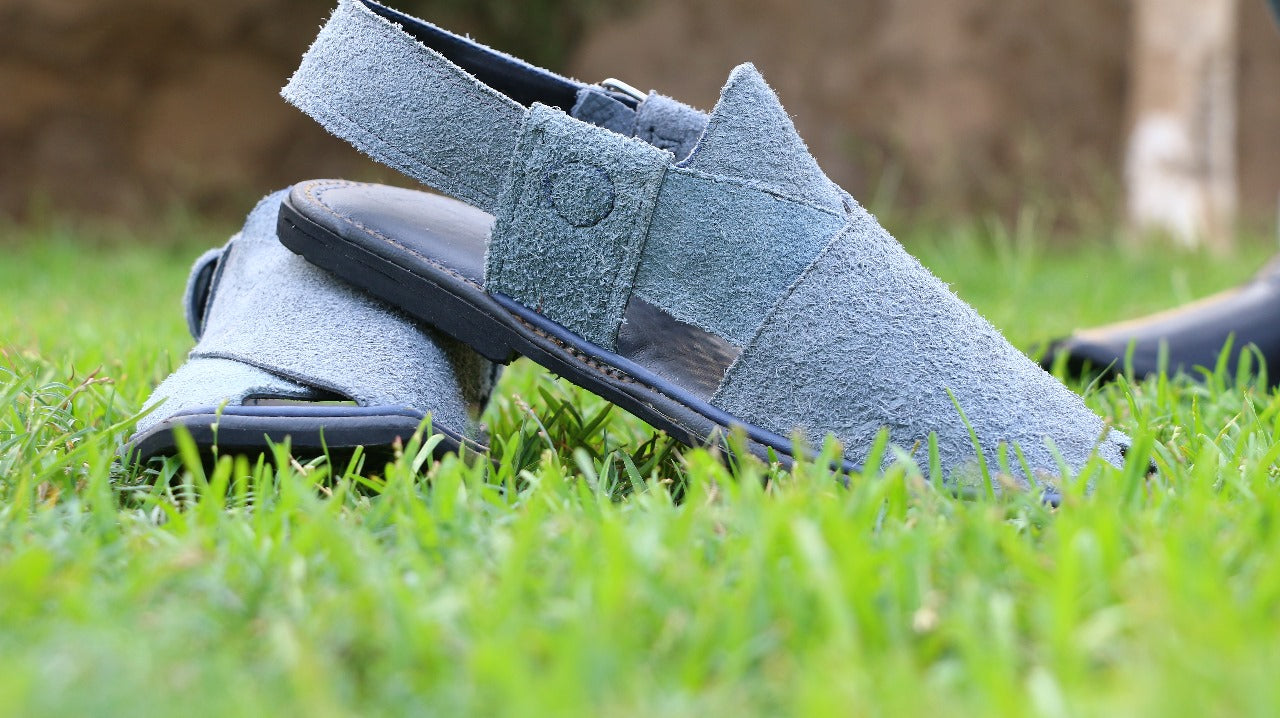 “Handmade footwear for timeless journeys.”